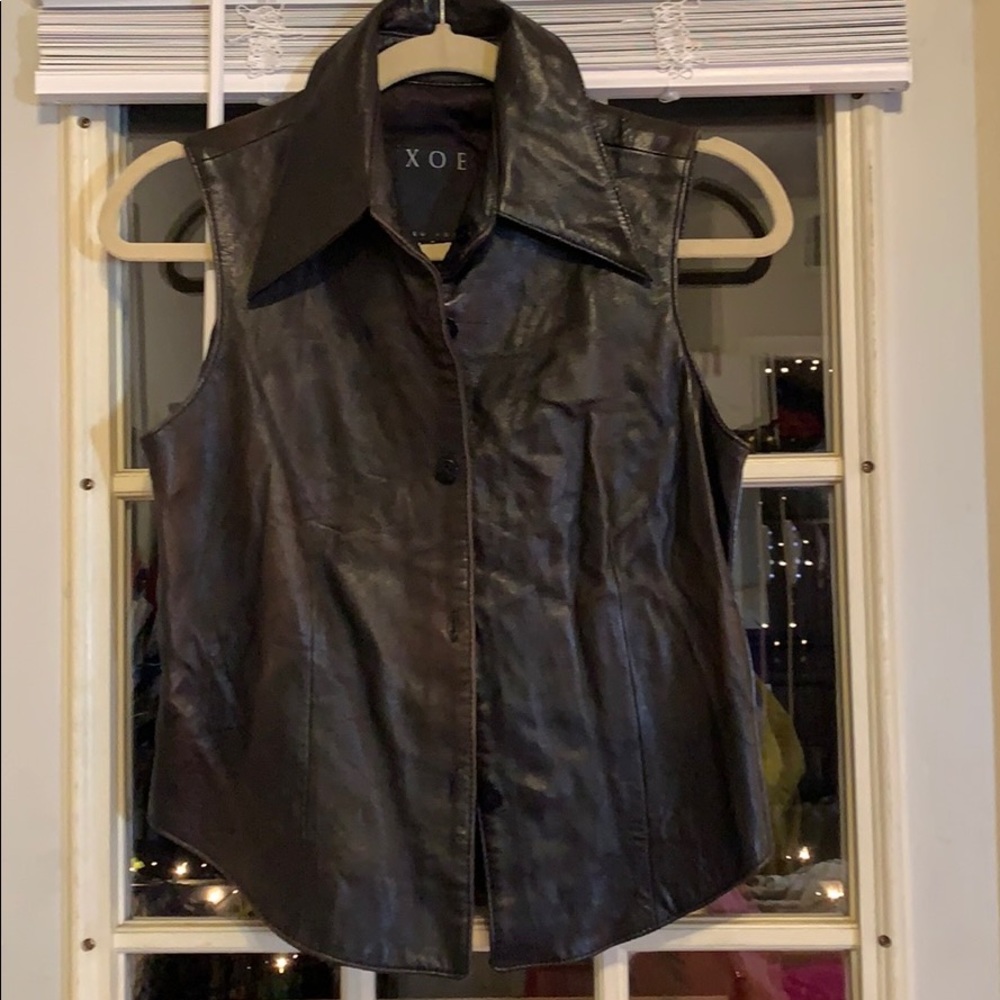 Leather vest.